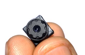 holding spy camera