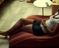 woman relaxing on sofa